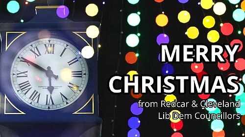 Redcar Christmas lights, with 'Merry Christmas' in bold capitals, and 'From Redcar & Cleveland LibDem Councillors' beneath in a smaller non-bold font.